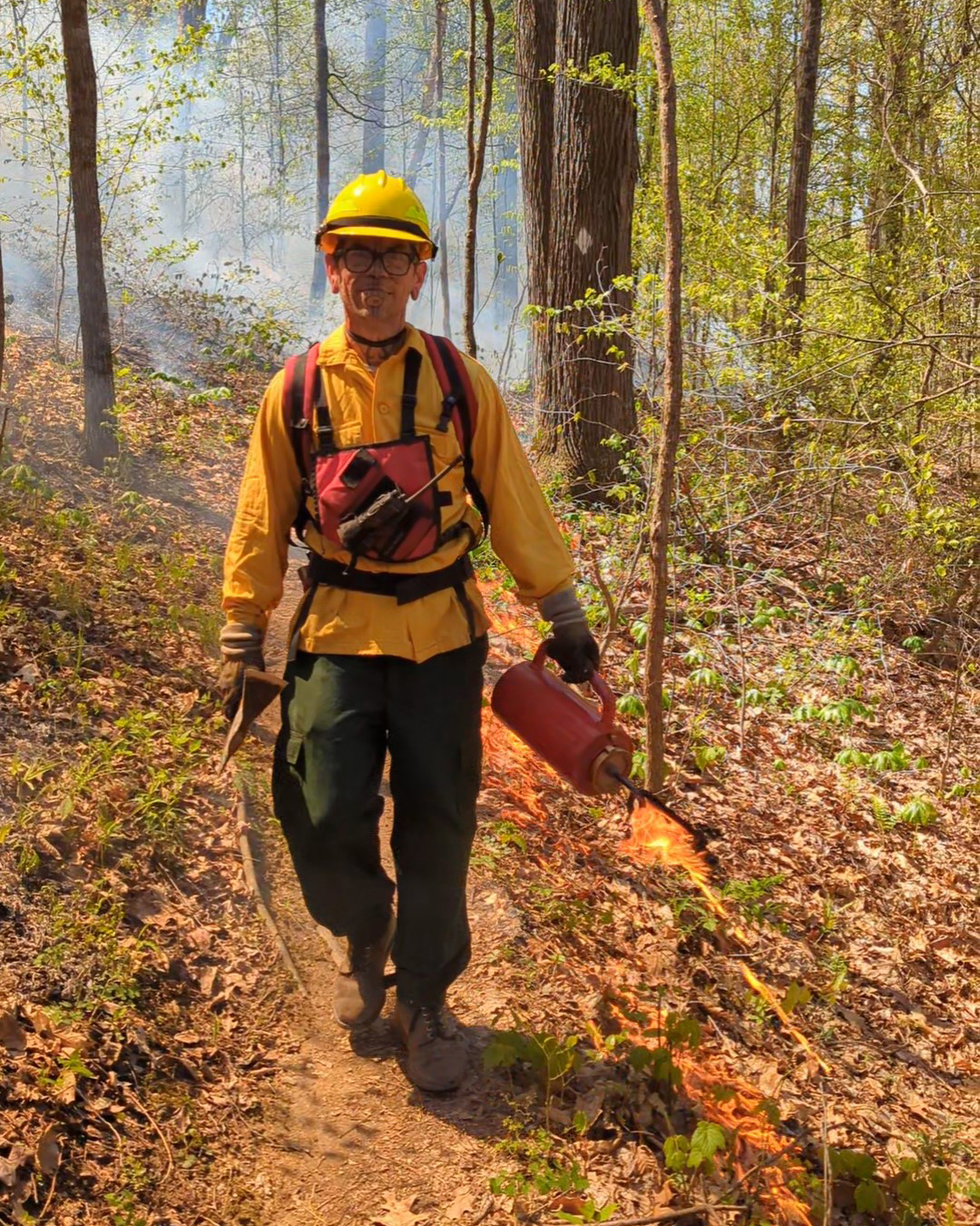 TNC volunteer Chris Donohue helping out at a prescribed burn.