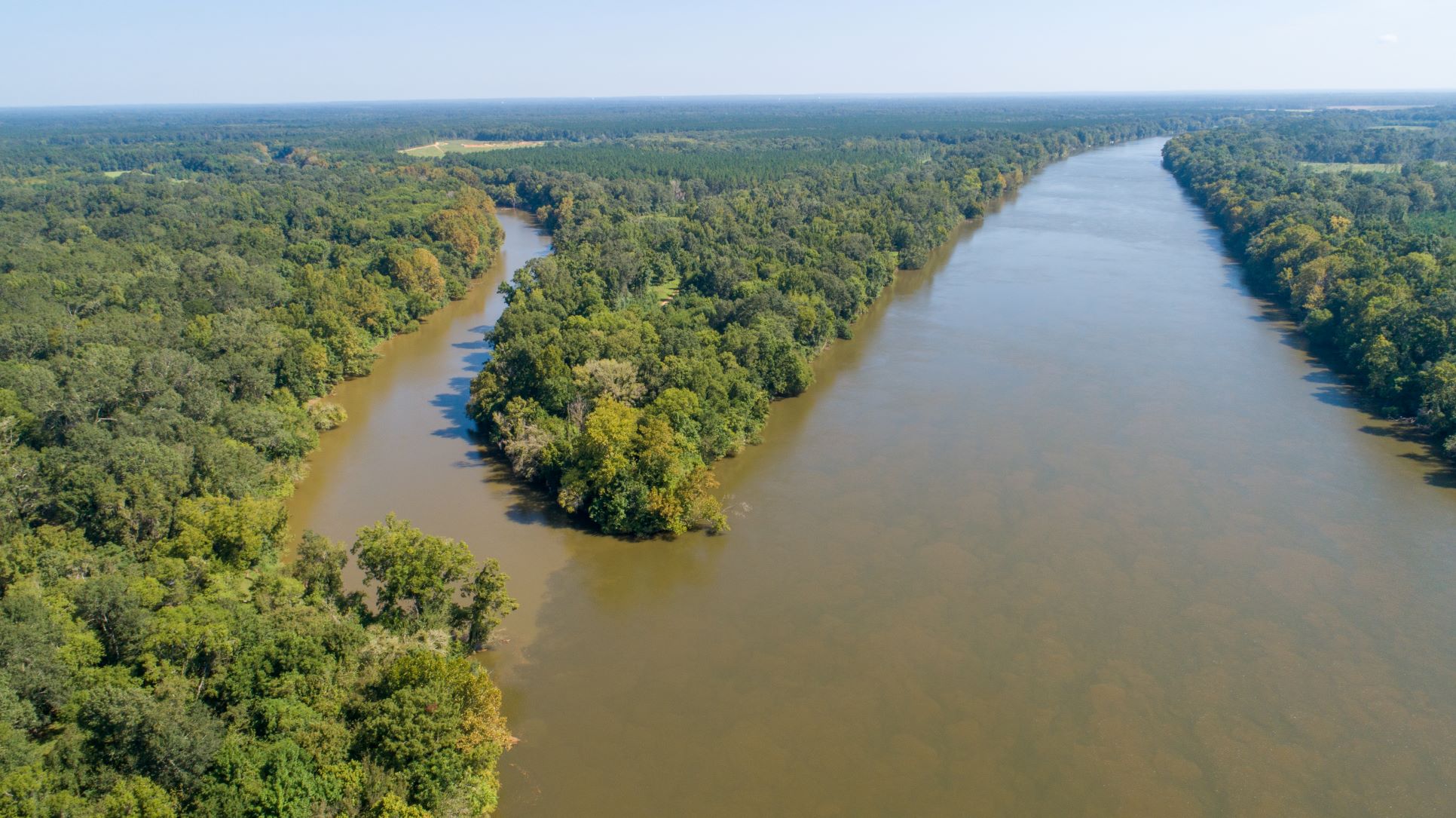 Aerial of two rivers combining. 