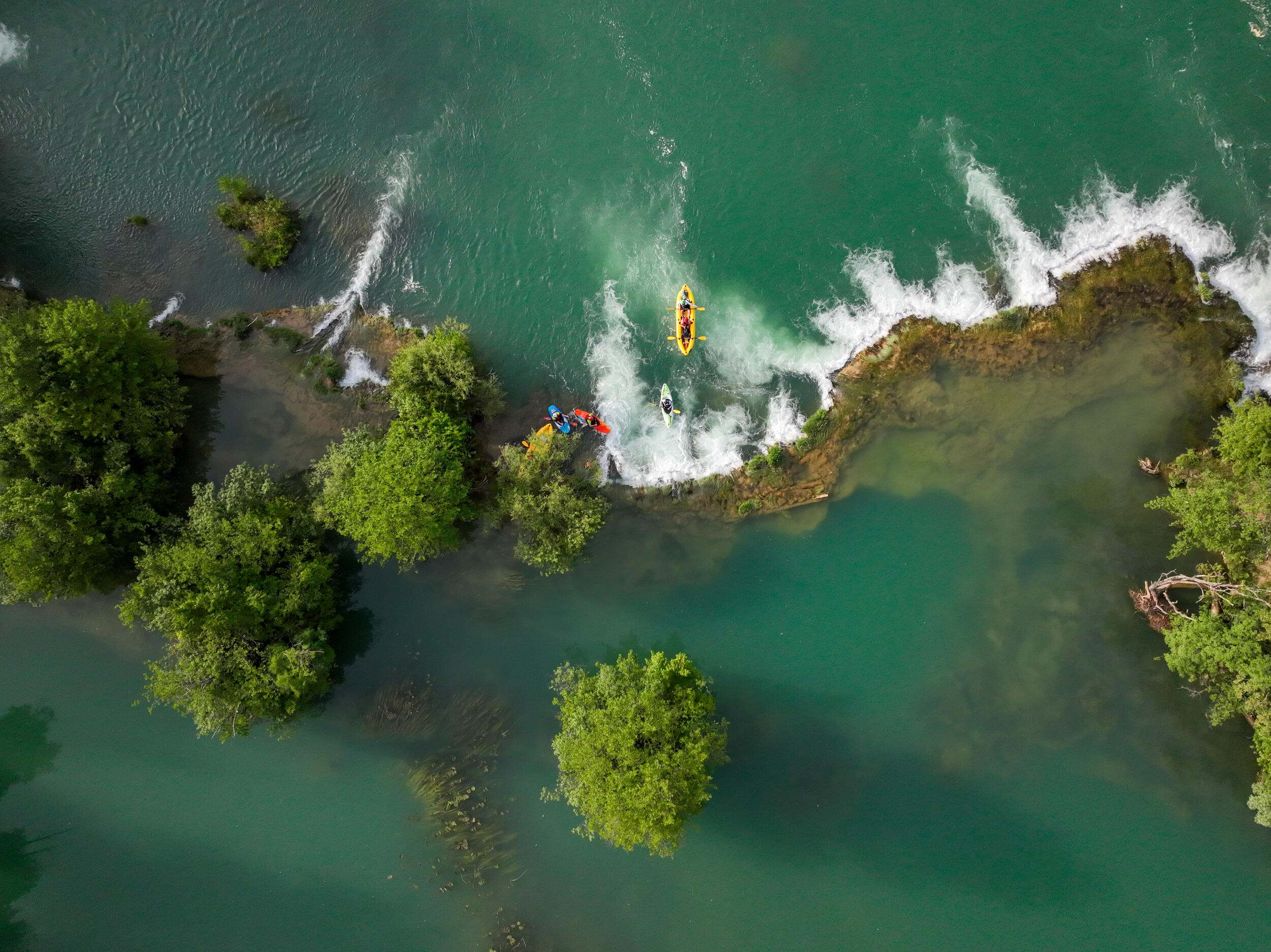 Aerial view of kayakers on Mreznica River.