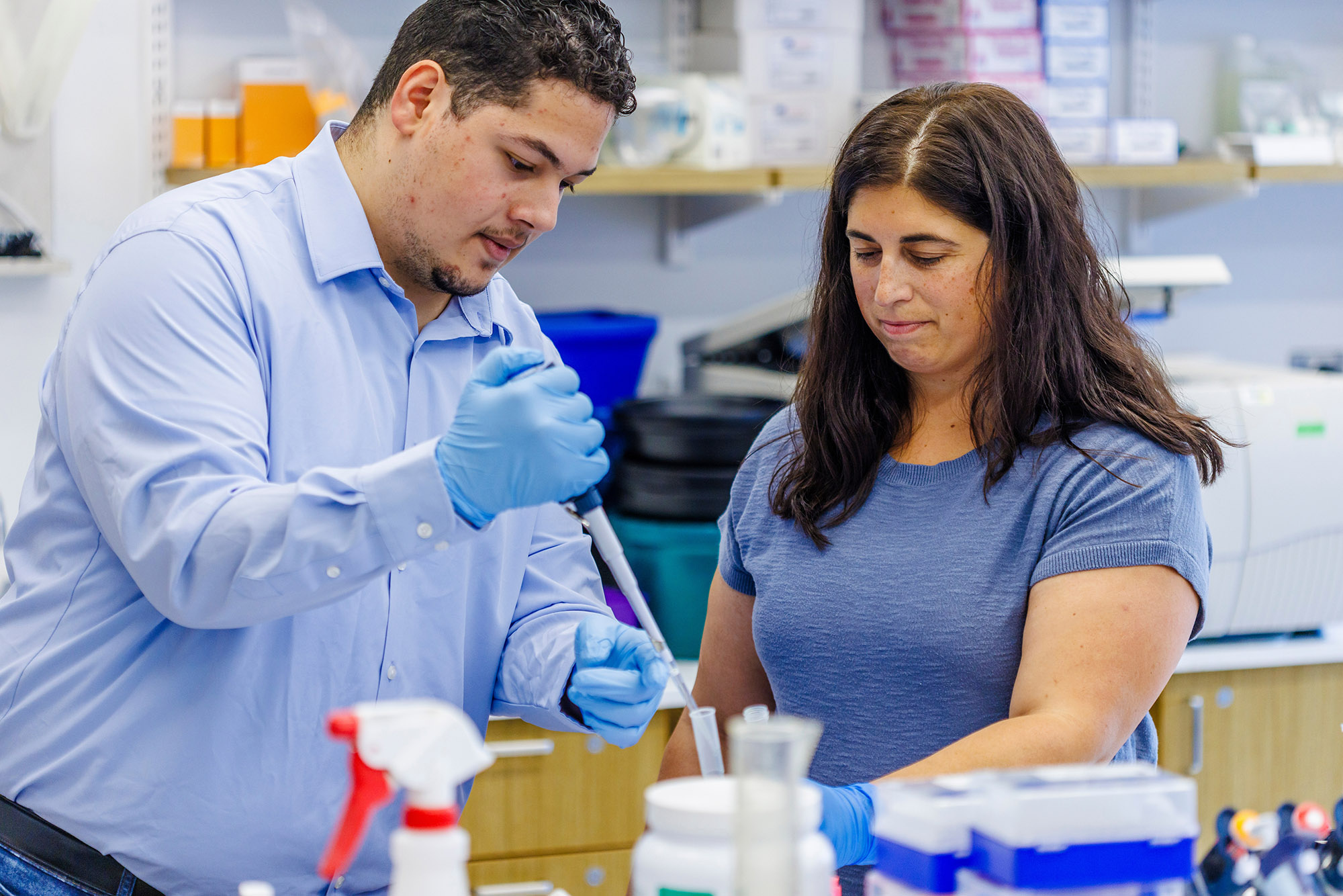 Christopher Guzman and Nicole Pauloski prepare tree DNA