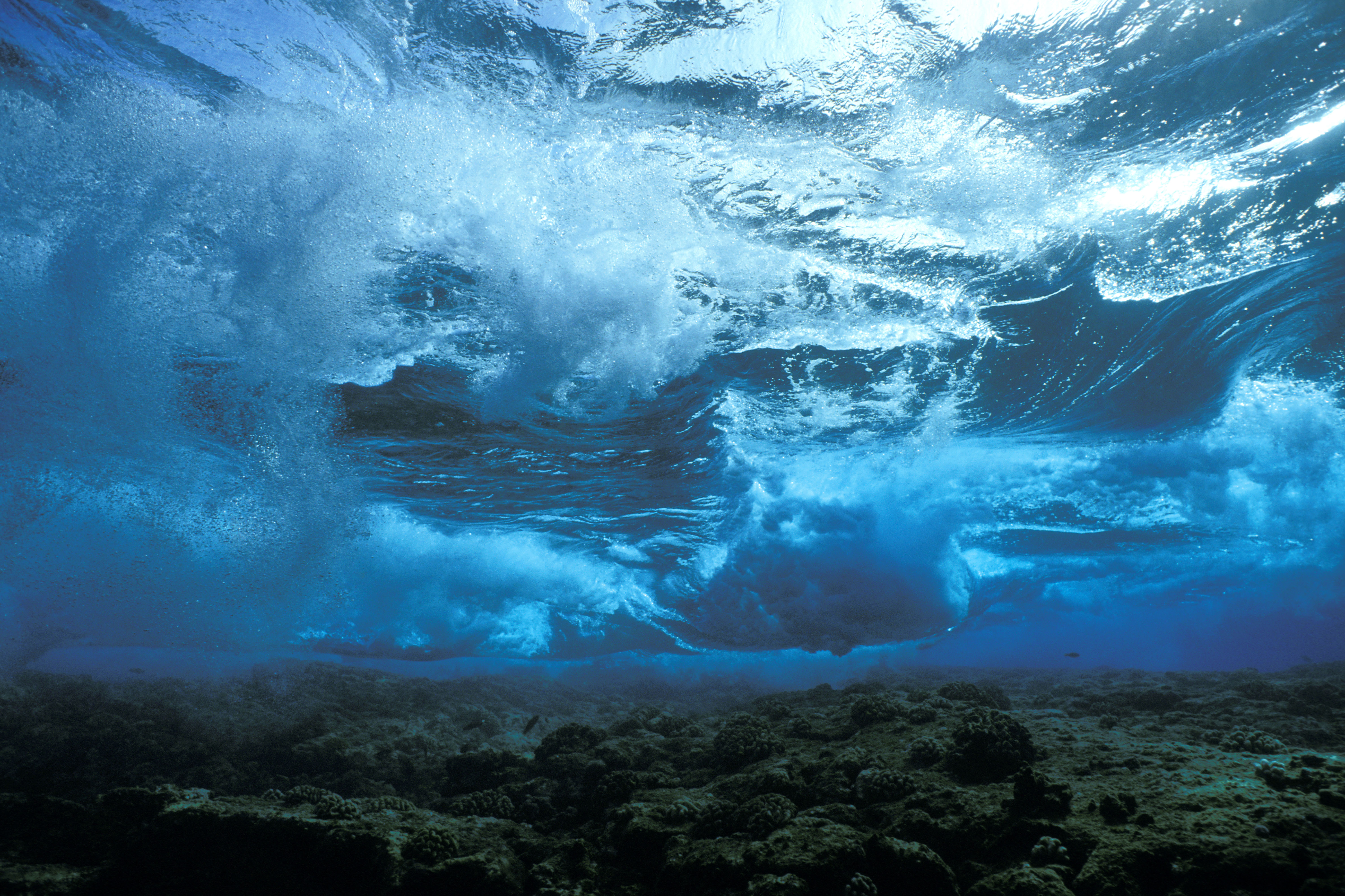 Ocean waves photographed from below.